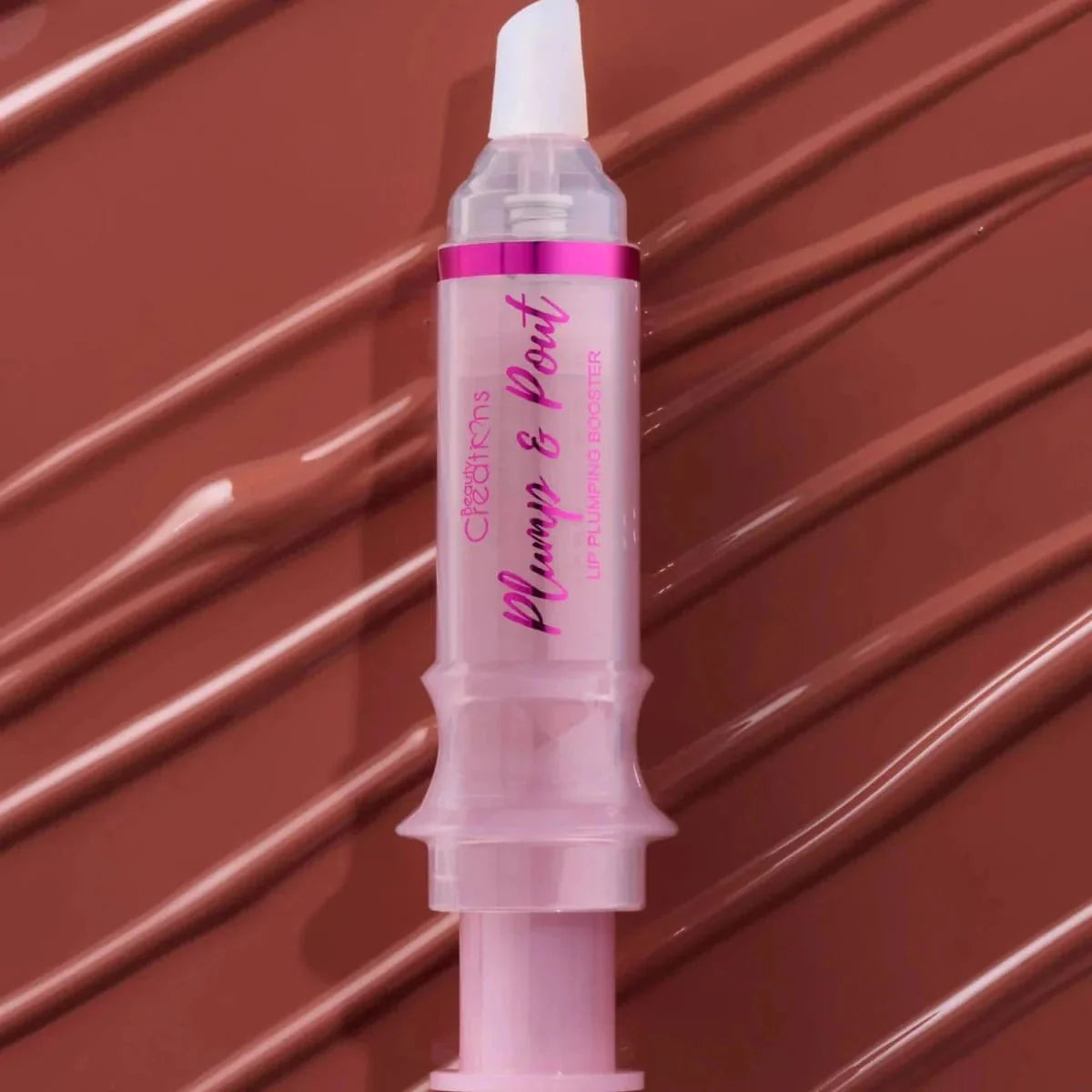 LIPGLOSS VOLUMINIZADOR PLUMP & POUT - BEAUTY CREATIONS