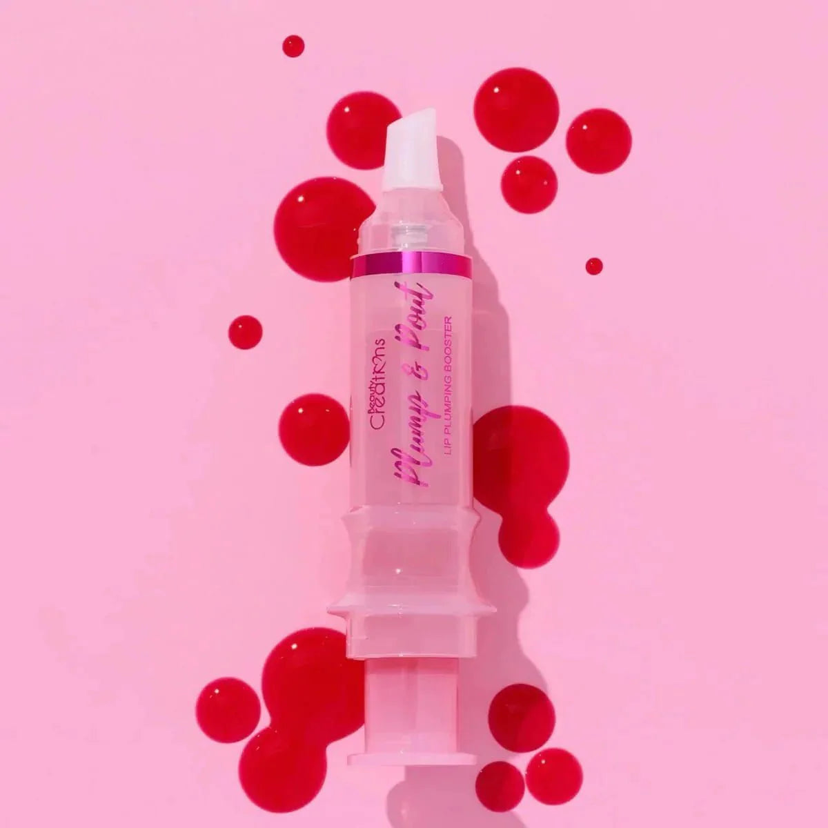LIPGLOSS VOLUMINIZADOR PLUMP & POUT - BEAUTY CREATIONS